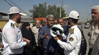 توزیع کلاه ایمنی رایگان در گلوگاه